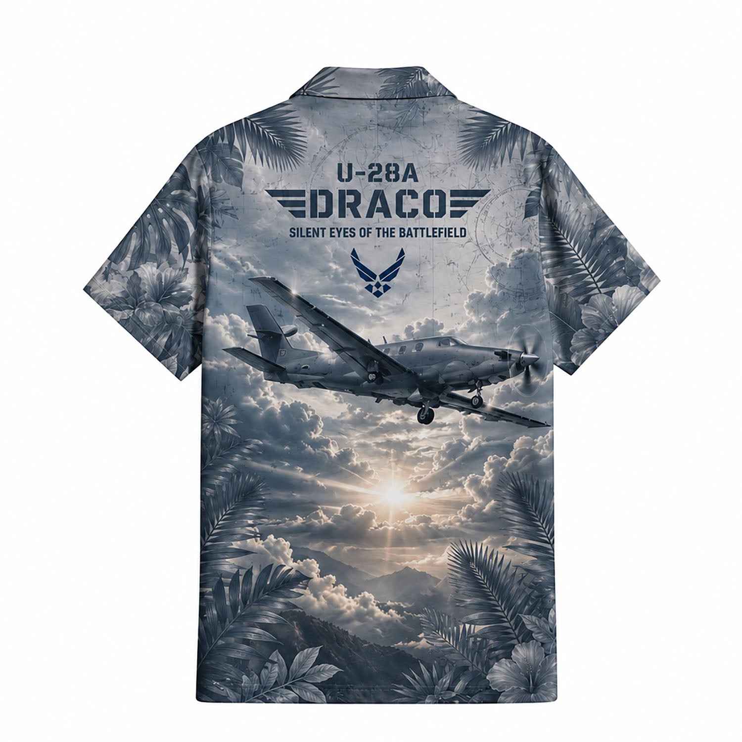 Back flat-lay view of the shirt showcasing the U-28A Draco recon aircraft soaring over sunlit mountains with bold "U-28A DRACO SILENT EYES OF THE BATTLEFIELD" texts