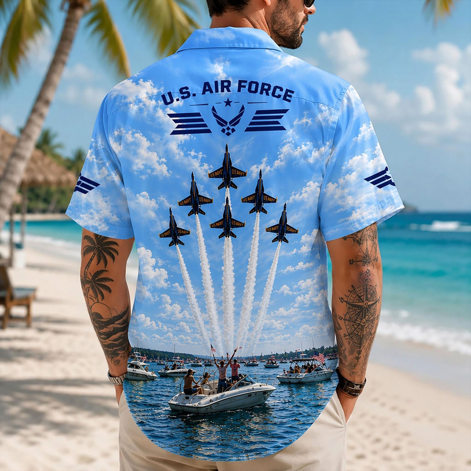 Back view lifestyle of a man showcasing the dynamic fighter jet formation graphics, white smoke streams, and clear ocean background