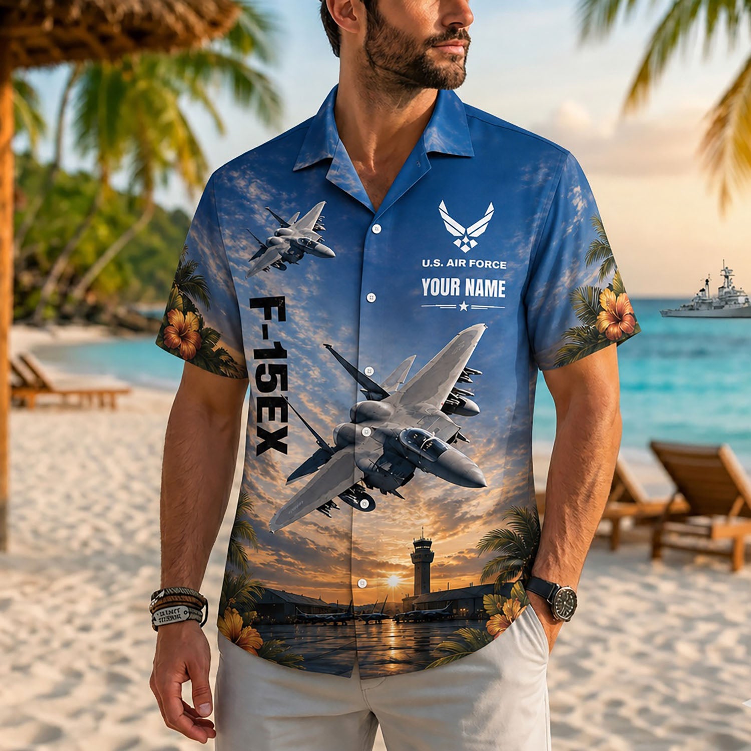 Close-up front view of a male model on a tropical resort beach wearing the personalized golden sunset jet pilot holiday shirt