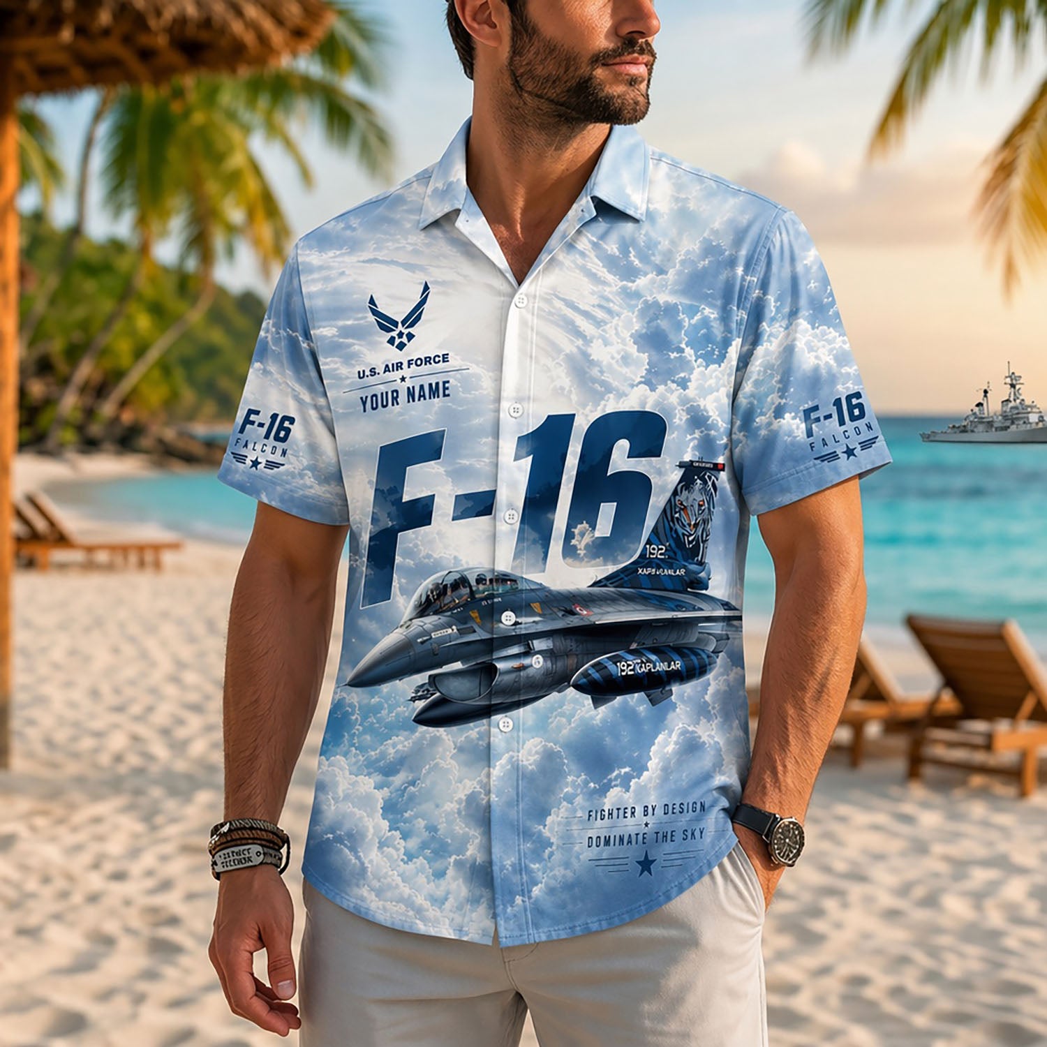 Close-up front view of a male model on a tropical resort beach wearing the personalized blue fighter jet pilot holiday shirt