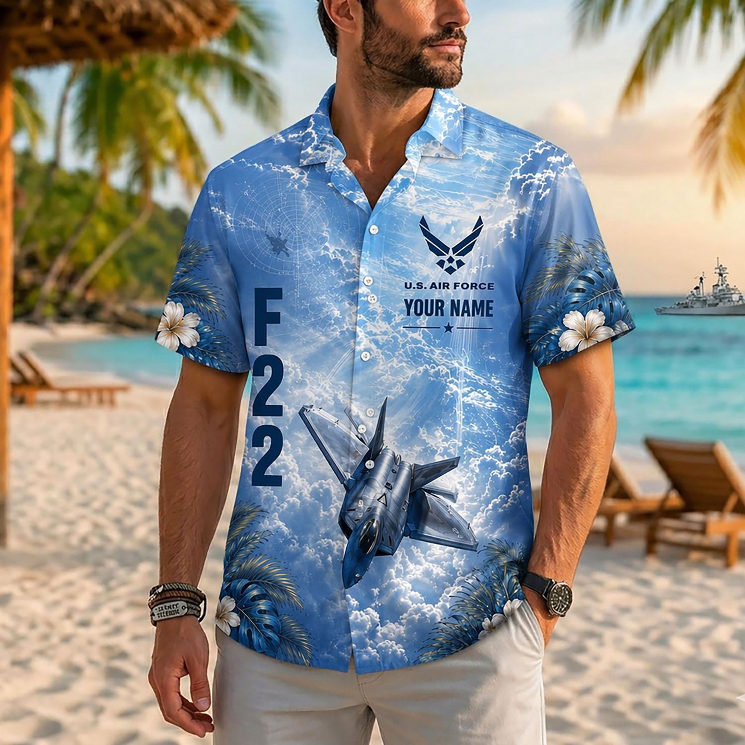 Close-up front view of a male model on a tropical coast beach wearing the personalized blue F-22 tactical pilot holiday shirt