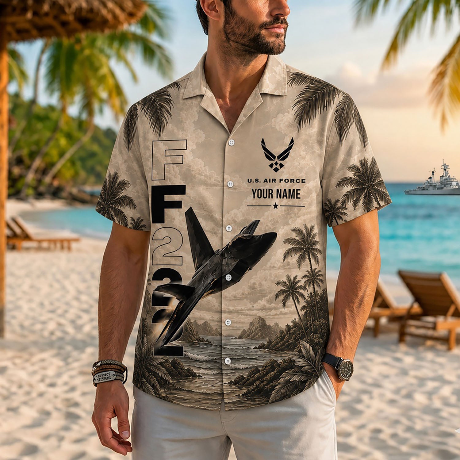 Close-up front lifestyle view of a man on a beach boardwalk wearing the personalized vintage tan F-22 stealth jet shirt