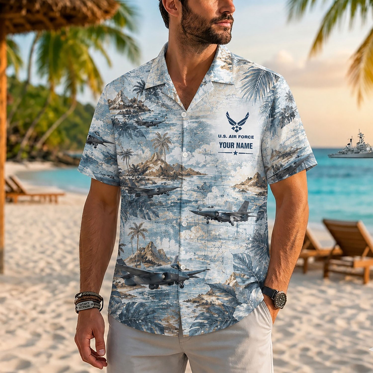 Close-up front view of a male model on a tropical resort beach wearing the personalized vintage cream jet pilot holiday shirt