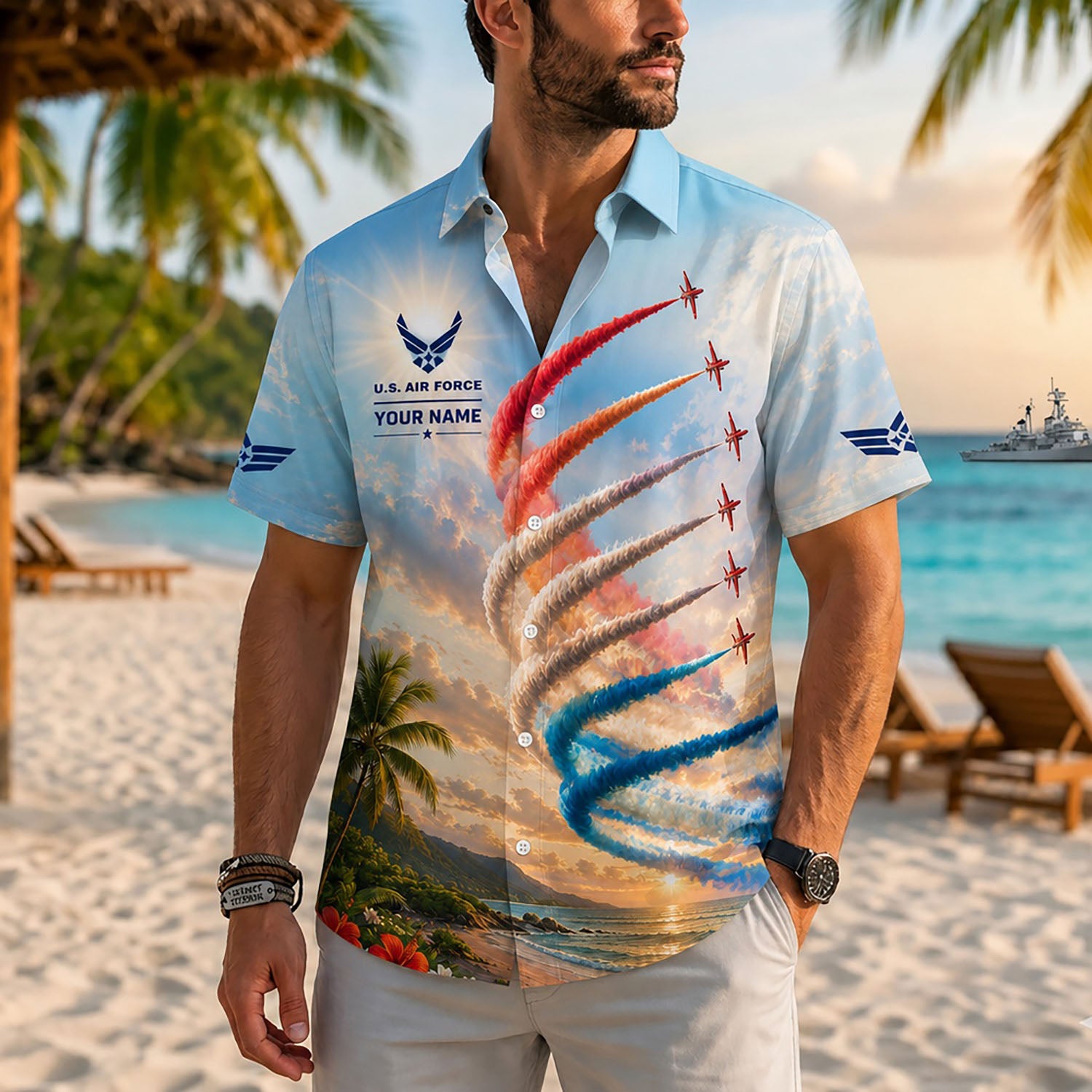 Close-up front lifestyle view of a man on a white-sand beach wearing the custom name military jet performance shirt during golden hour