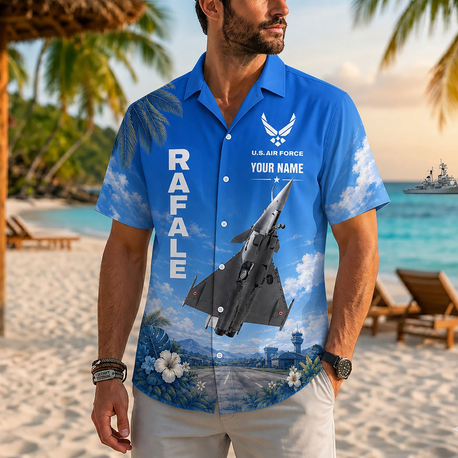 Close-up front view of a male model on a tropical resort beach wearing the personalized blue fighter jet pilot holiday shirt