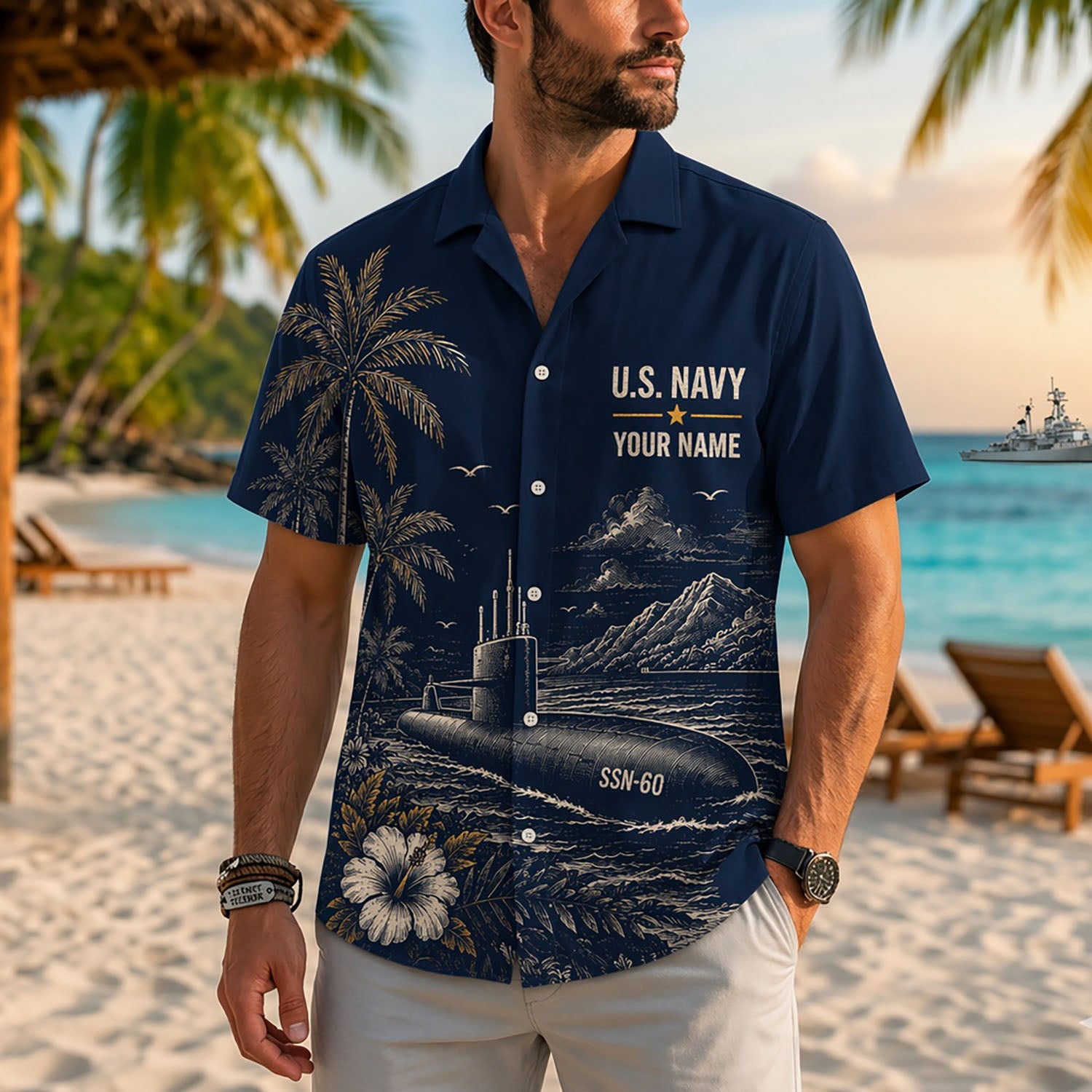 Close-up front view of a male model on a tropical beach wearing the personalized deep navy US Navy submarine veteran shirt
