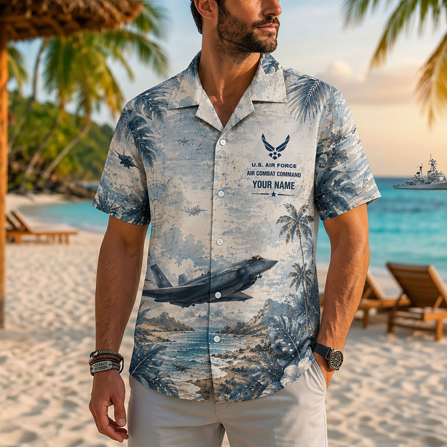Close-up front lifestyle view of a man on a sunny beach resort wearing the custom indigo tropical F-35 stealth jet veteran shirt