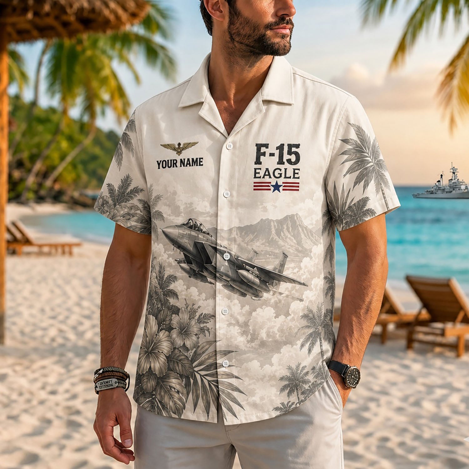 Close-up front view of a male model on a beach wearing the personalized khaki F-15 Eagle fighter jet resort shirt