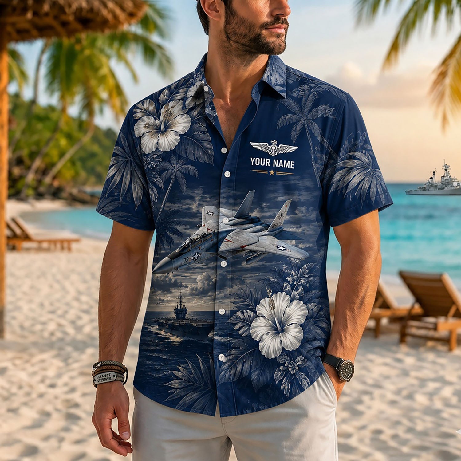 Close-up front view of a male model on a beach wearing the personalized dark navy F-14 Tomcat fighter jet tropical shirt
