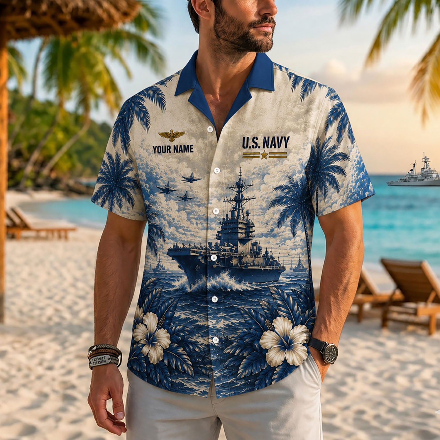 Close-up front view of a male model on a beach wearing the personalized cream US Navy battleship resort shirt with a contrast blue collar
