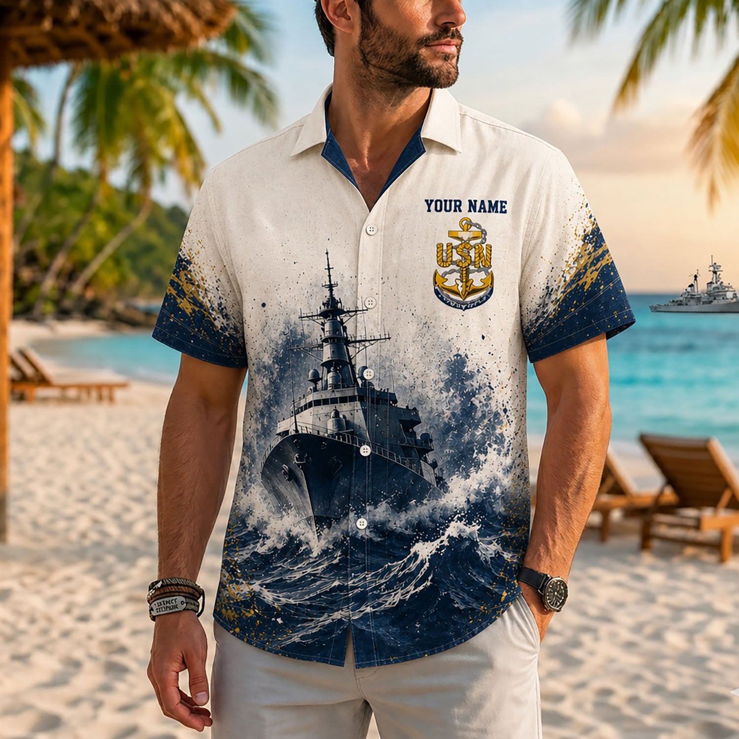 Close-up front view of a male model on a tropical beach wearing the personalized cream US Navy Chief Surface Warfare battleship shirt