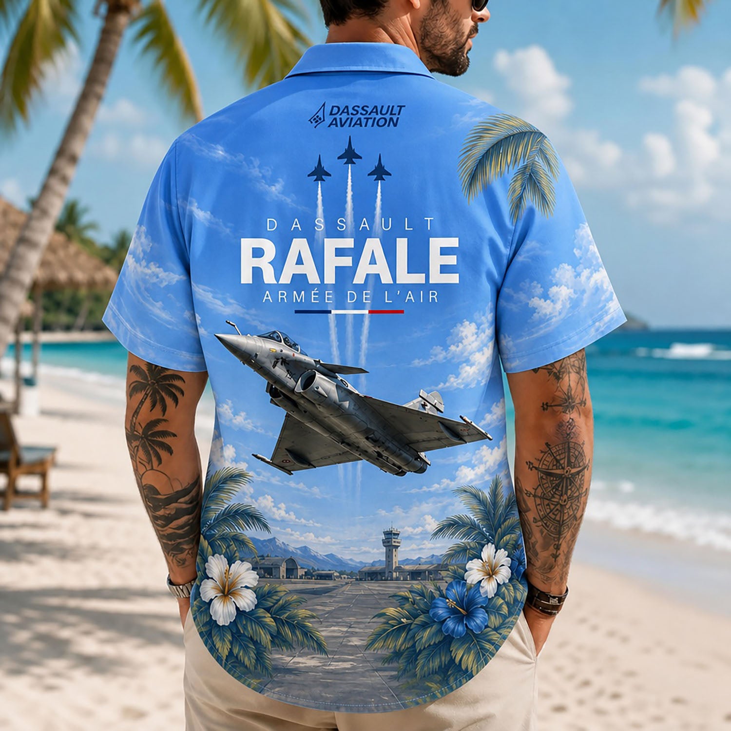 Back view lifestyle of a male model showcasing the sharp Dassault Aviation lettering, blue hibiscus flowers, and runway backgrounds