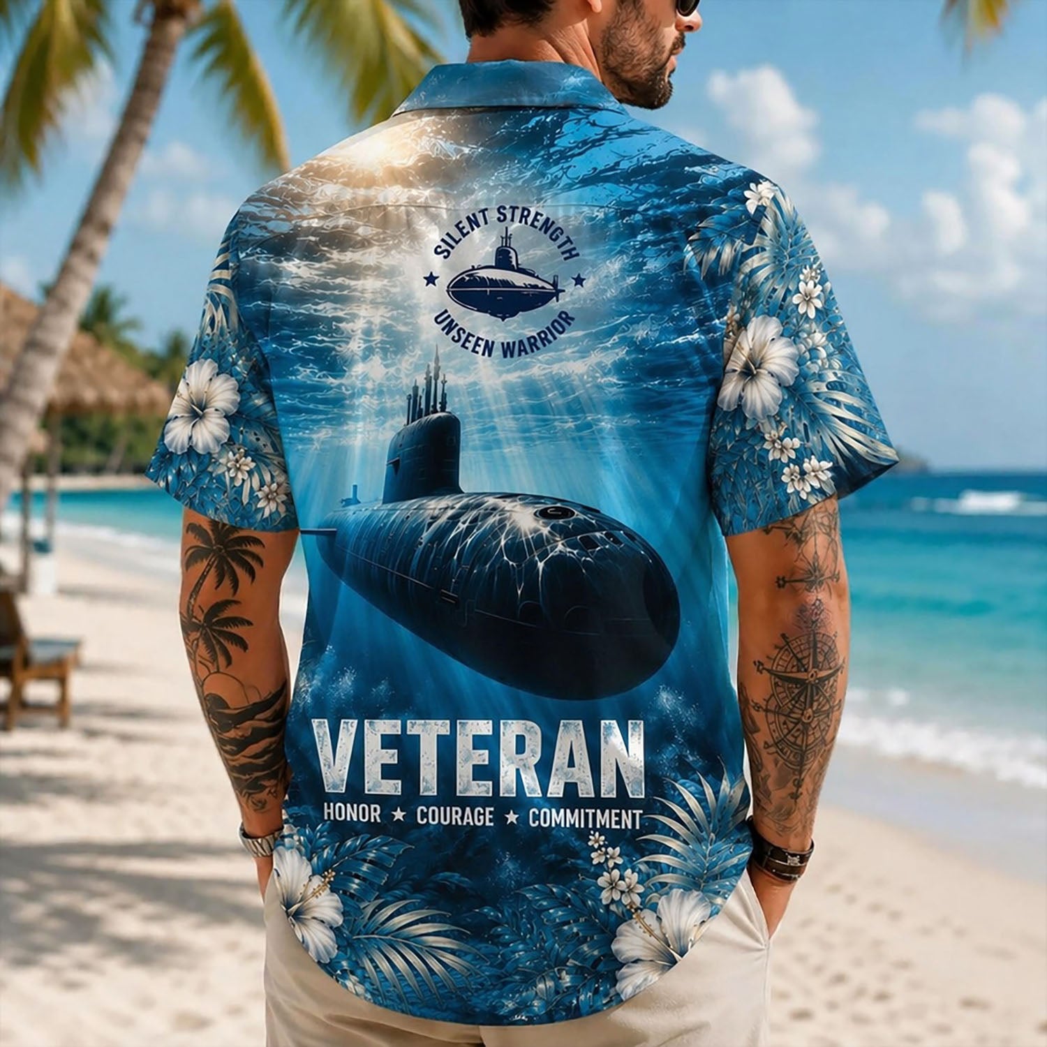 Back view lifestyle of a man on a beach displaying the detailed deep-sea warship graphic and veteran service values