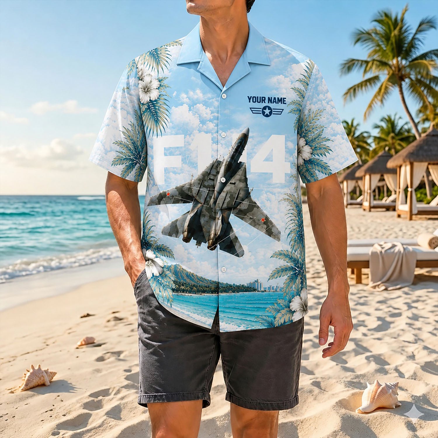 Full shot of a male model posing on a sunny shore wearing the custom Northrop Grumman F-14 Tomcat aviation shirt with dark shorts