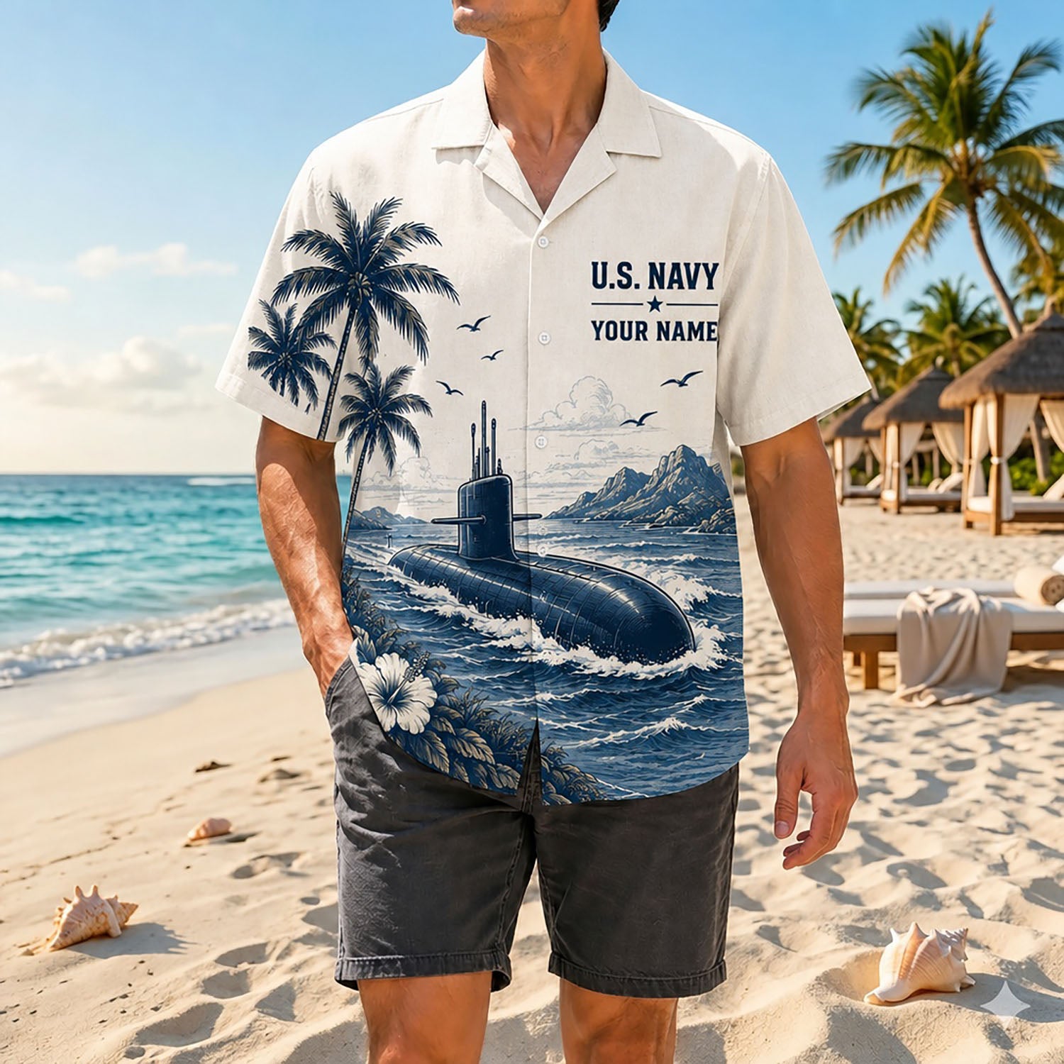 Full shot of a male model posing on a shore wearing the personalized US Navy SSN-767 submarine tropical shirt paired with dark gray shorts