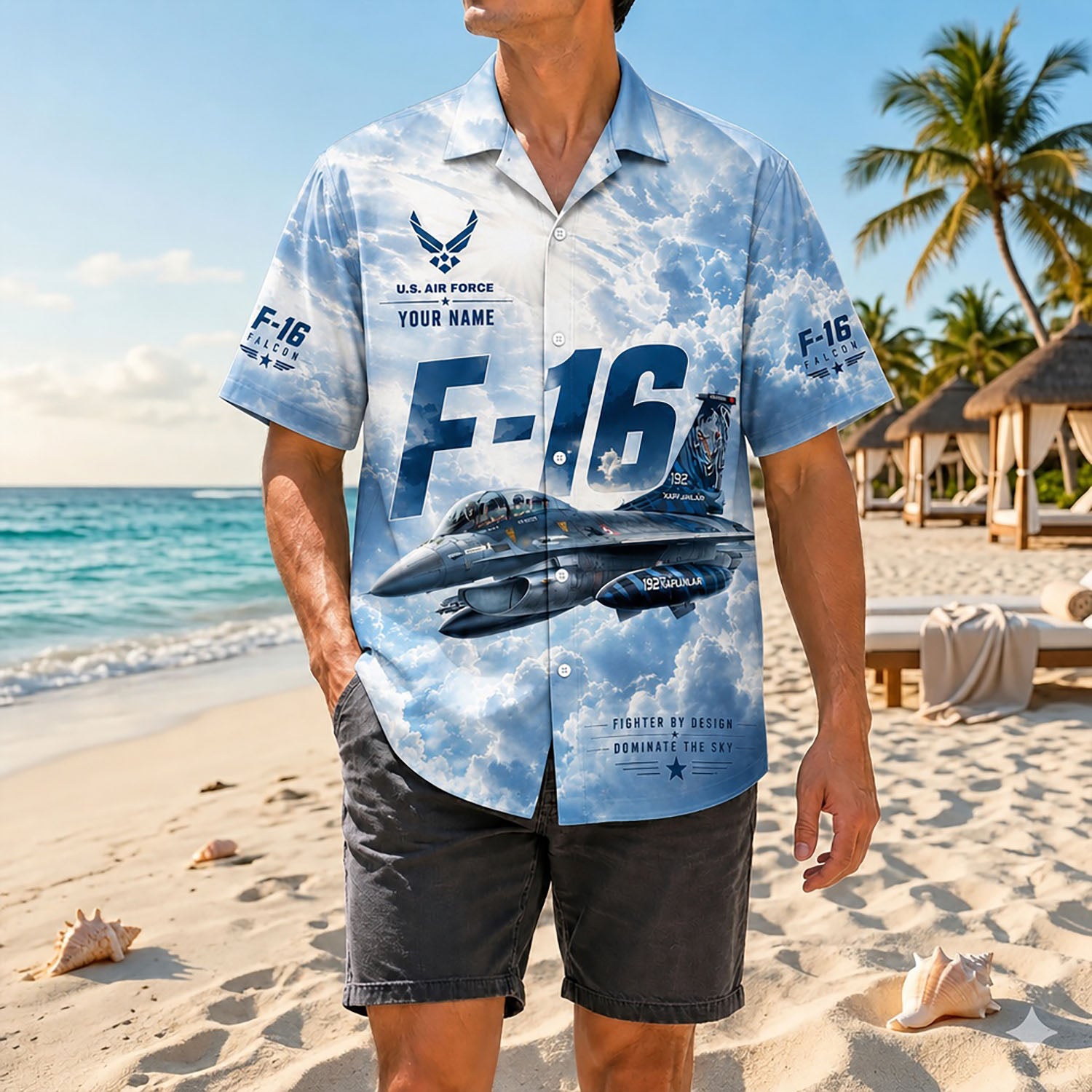 Full shot of a male model standing on a sunny coast wearing the custom name F-16 aviation shirt paired with dark casual shorts