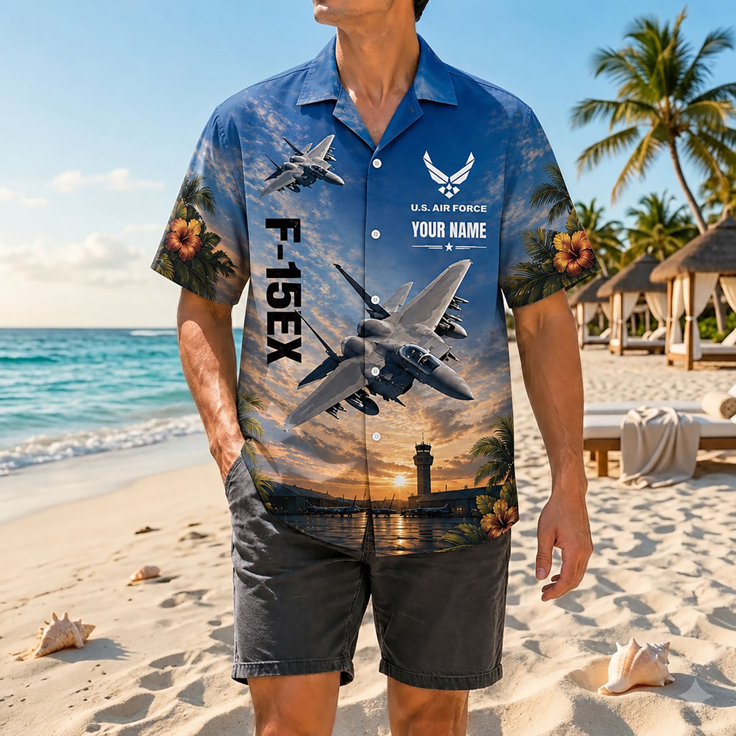 Full shot of a male model standing on a sunny coast wearing the custom name F-15EX aviation shirt paired with dark casual shorts