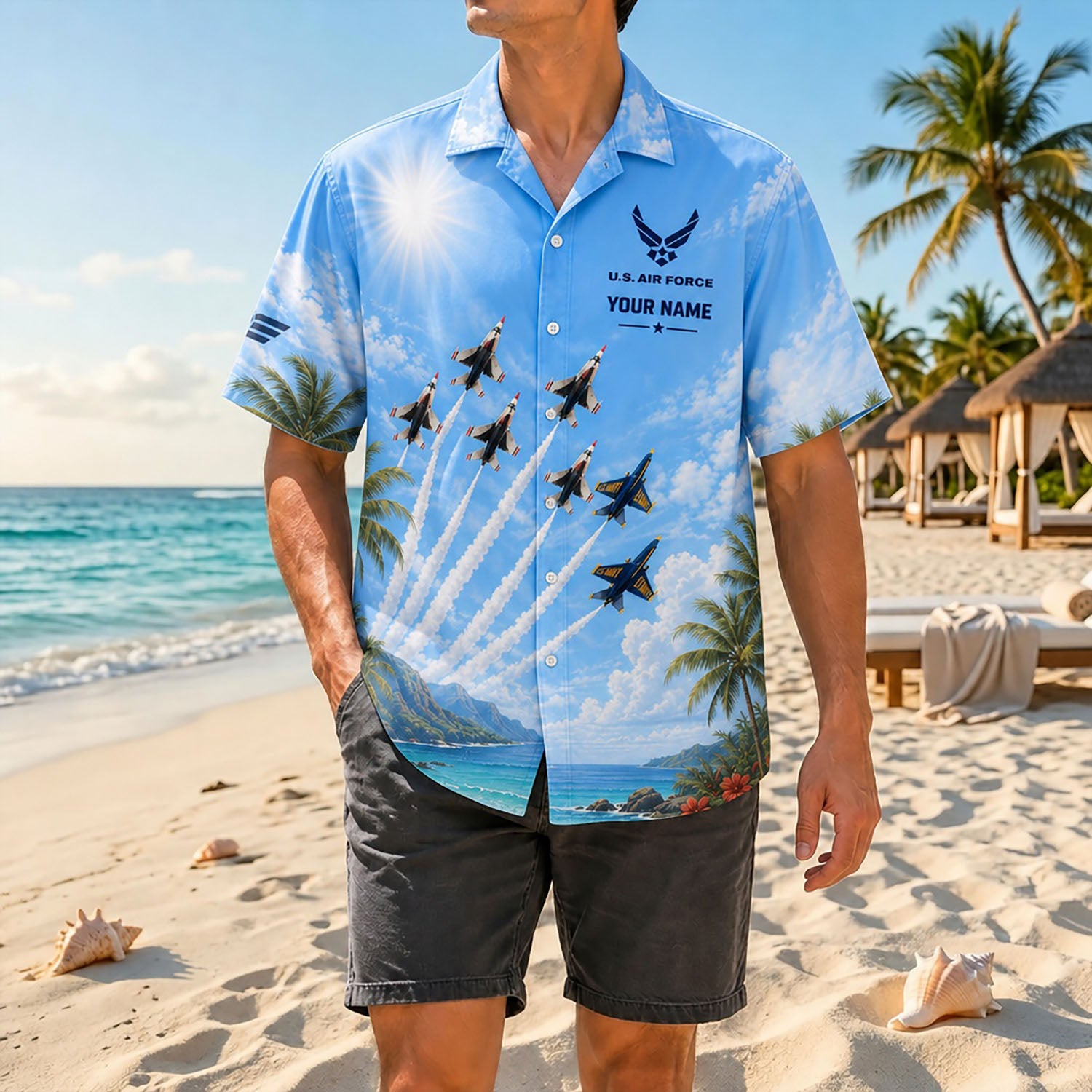 Full-body shot of a man modeling the custom military aviation airshow shirt on a sandy shore paired with dark grey casual shorts