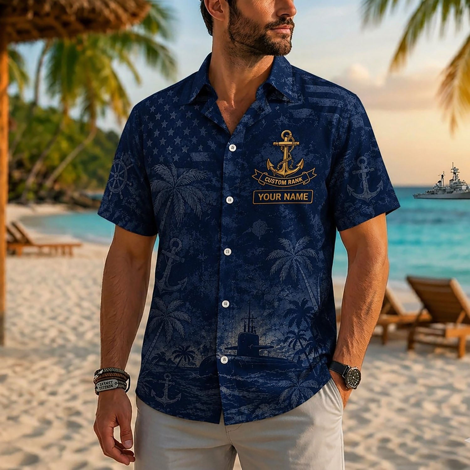Close-up front view of a male model on a tropical beach wearing the custom blue US Navy family tribute Hawaiian shirt with gold text accents