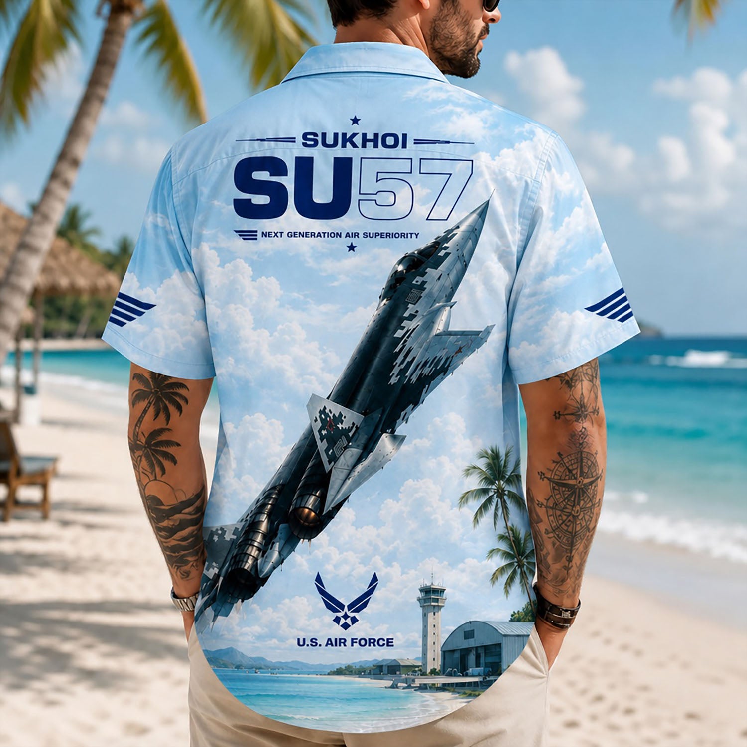 Back view lifestyle of a man showcasing the detailed Su-57 digital camo jet graphics and airfield hangar on sand