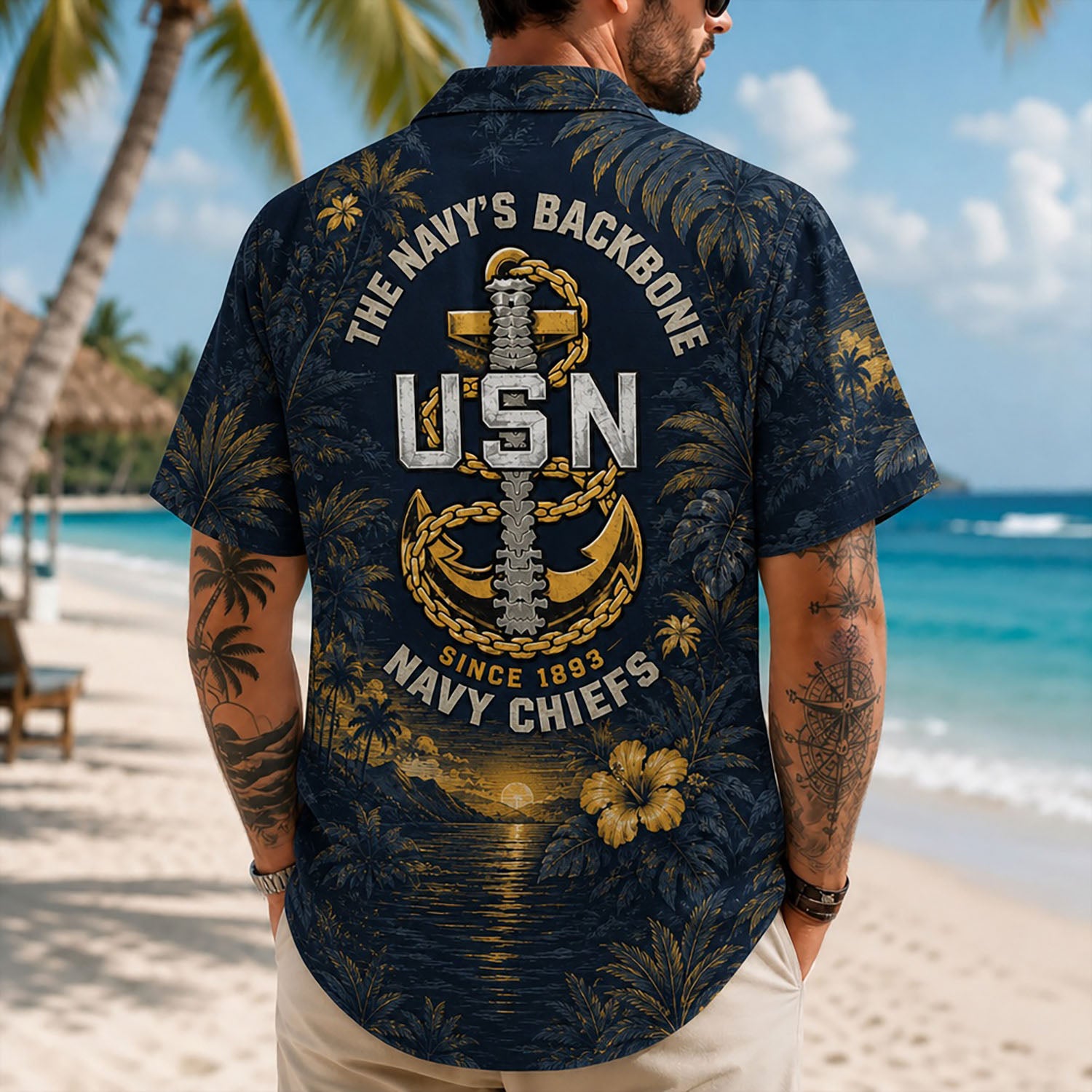 Back view lifestyle of a man showing the dramatic sunset warship graphics and patriotic Navy Chiefs statement typography