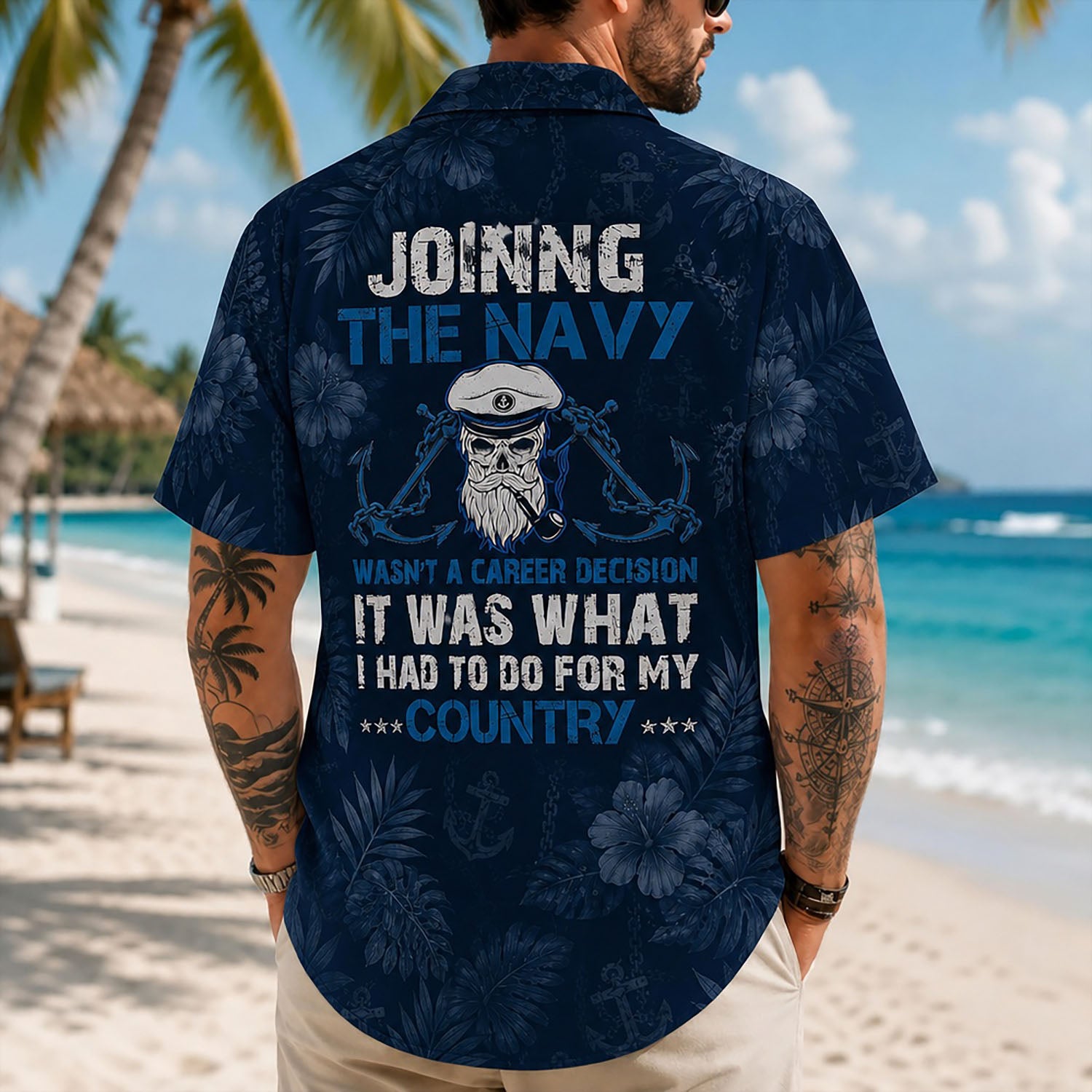 Back view lifestyle of a man on a beach displaying the detailed "For My Country" quote and bearded captain skull emblem