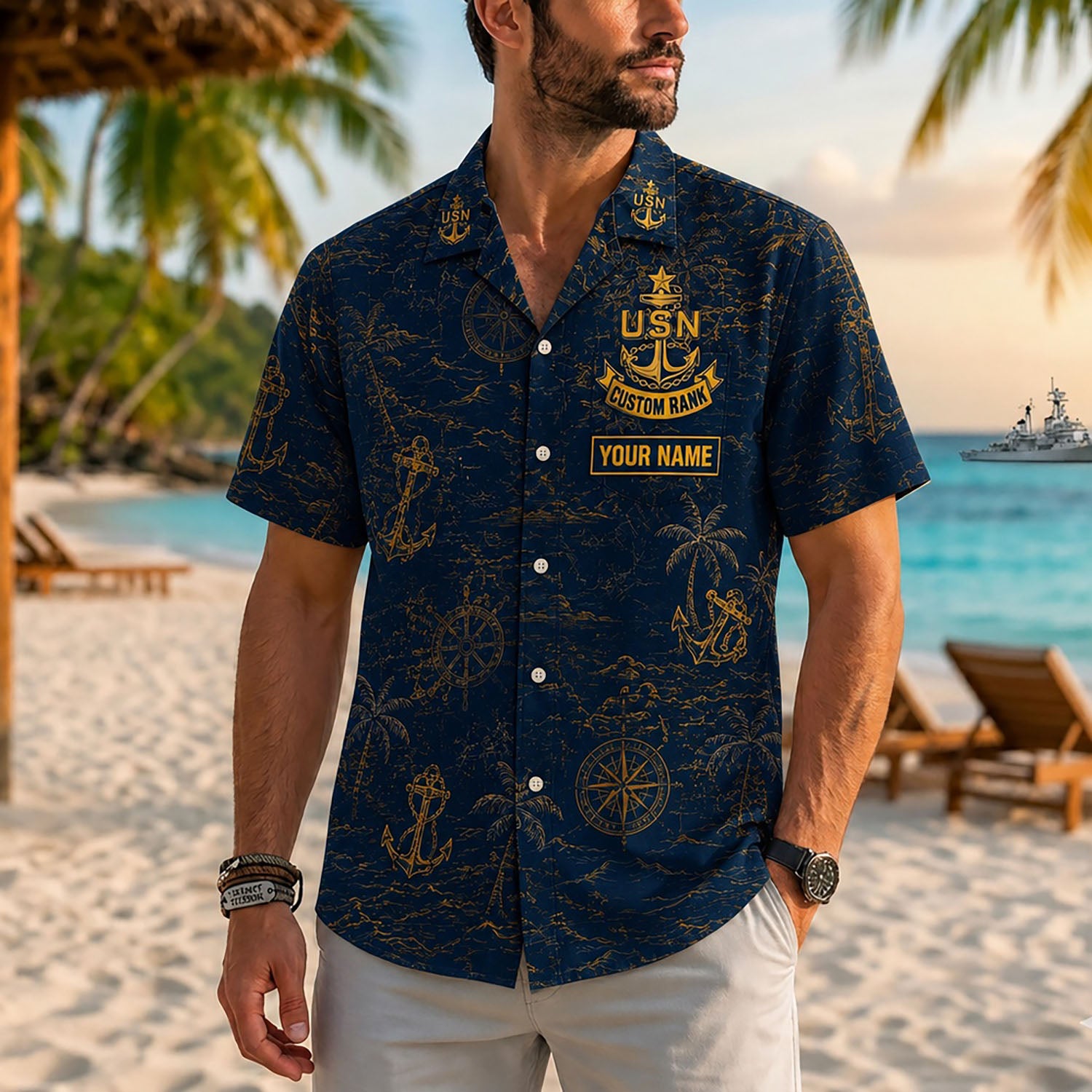 Close-up front view of a male model on a tropical beach wearing the custom USN Chief Petty Officer gold and navy Hawaiian shirt