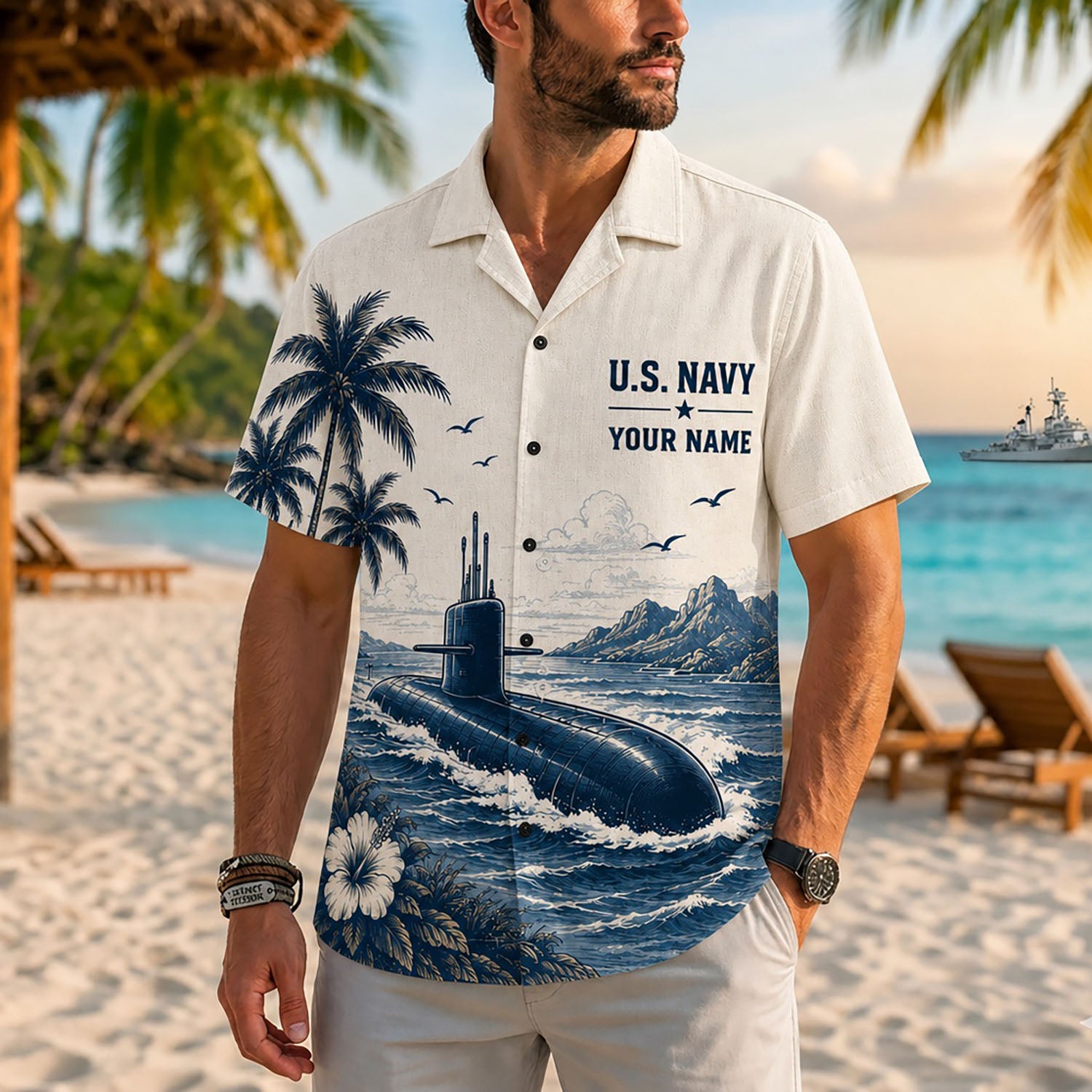 Close-up front view of a male model on a tropical beach wearing the personalized cream US Navy submarine military Hawaiian shirt