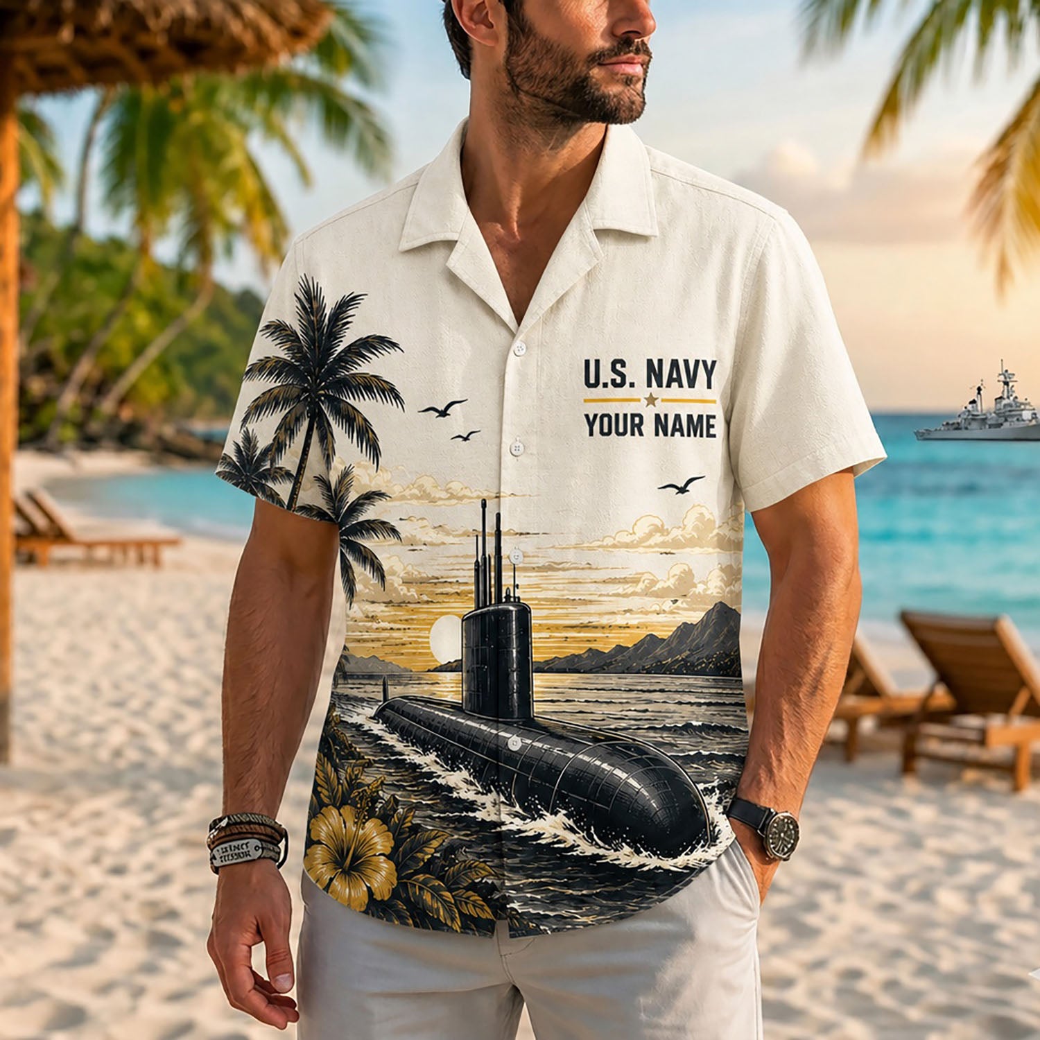 Close-up front view of a male model on a tropical beach wearing the personalized golden sunset cream US Navy submarine Hawaiian shirt